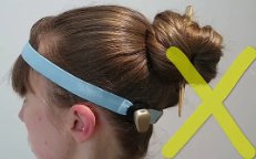 This image shows the incorrect way to wear baha hearing aid accessories